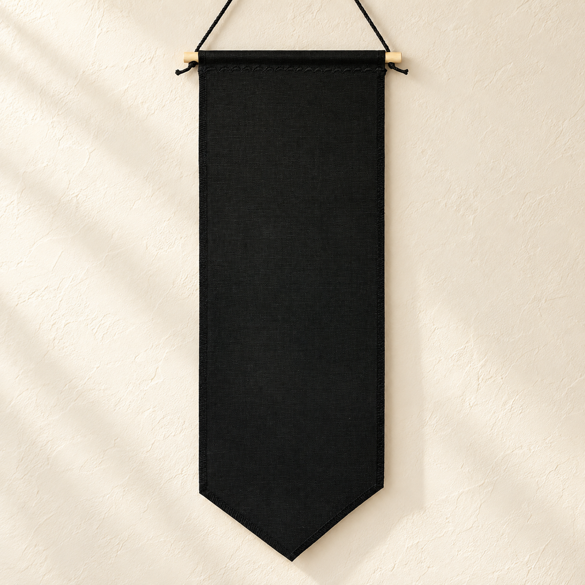 Black Tall Duck Canvas Pin Pennant (No Backing) in a clean ivory wall setting