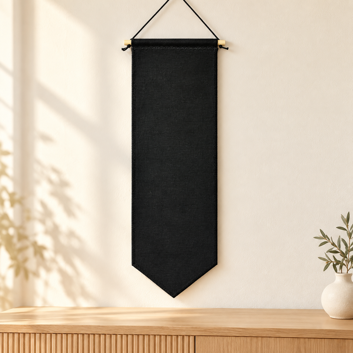 Black Tall Duck Canvas Pin Pennant (No Backing) in a clean light wood setting