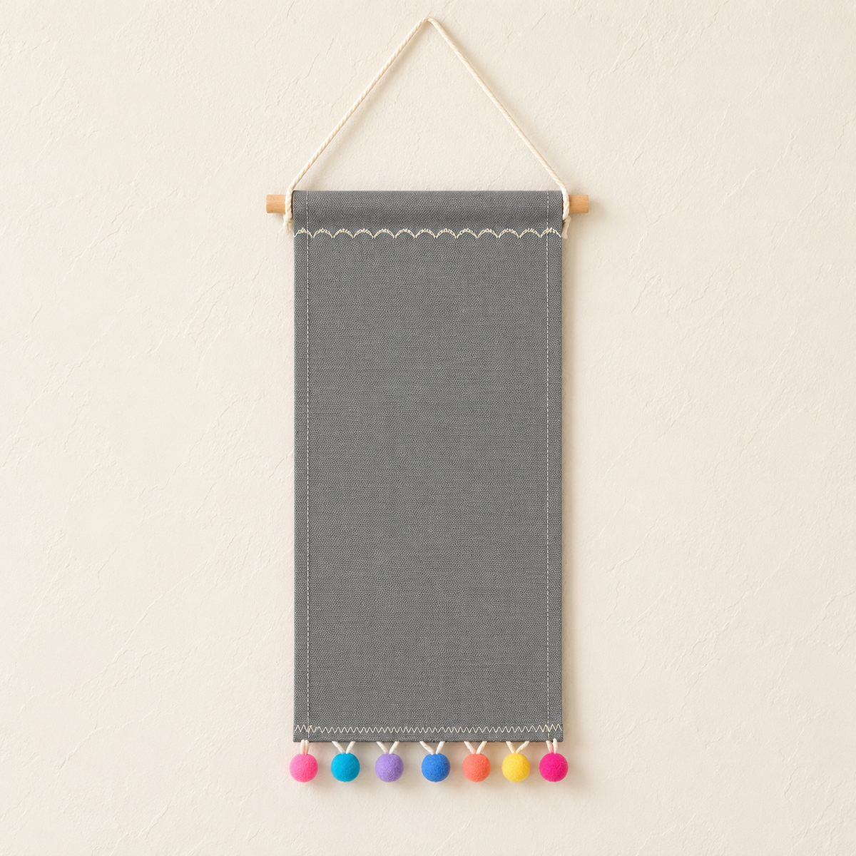 Gray Pom Pom Canvas Pin Pennant — ivory wall hero